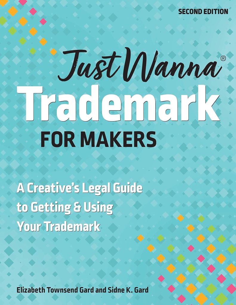 Cover of the book 'Just Wanna Trademark for Makers', featuring a teal background with colorful geometric shapes and white text.