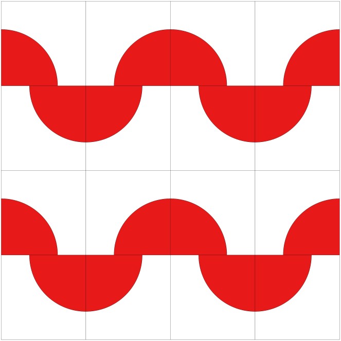 A quilt block design featuring alternating red and white curved segments arranged in a 2x2 grid pattern, creating a wave-like effect.