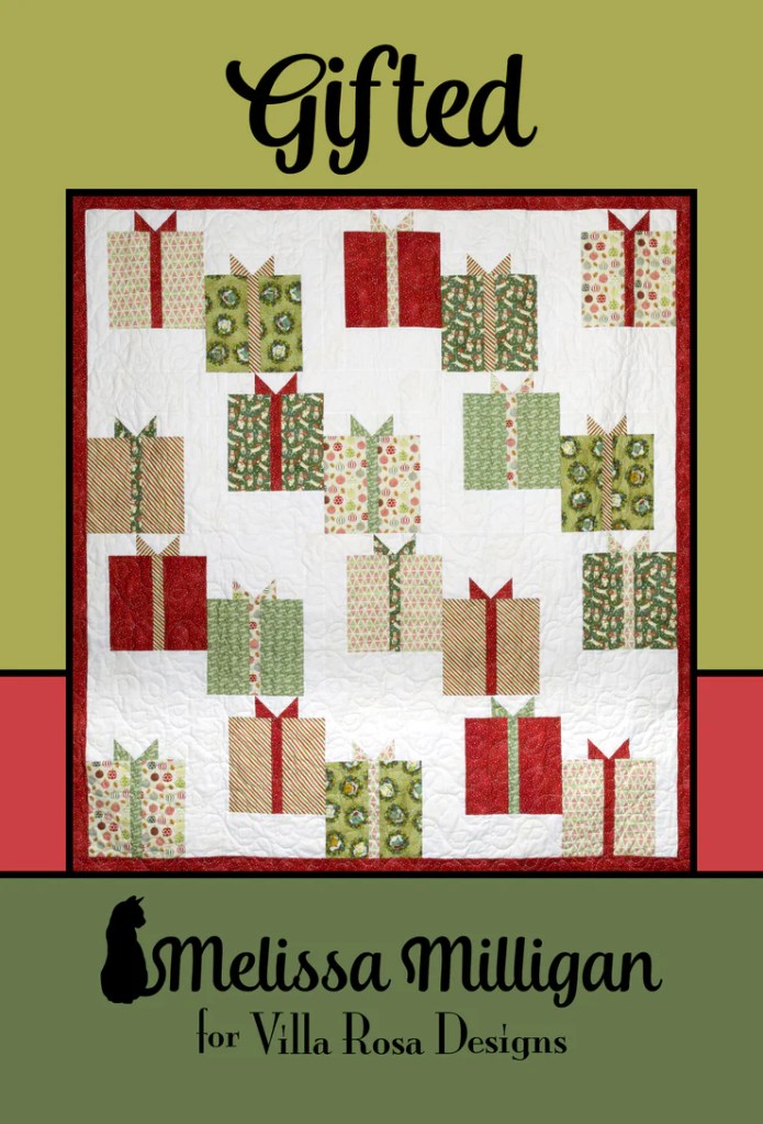 Quilt design titled 'Gifted' featuring a pattern of gift boxes in festive colors, designed by Melissa Milligan for Villa Rosa Designs.
