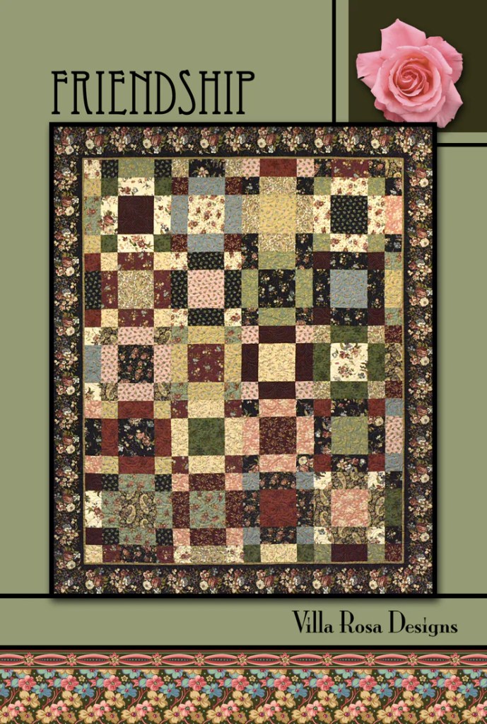 A quilt pattern titled 'Friendship' featuring a patchwork design with various floral and patterned squares in earthy tones, bordered with a floral fabric and a rose graphic on a green background.