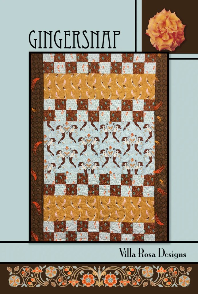 The Gingersnap quilt design features a combination of patterned fabrics in warm and cool tones, arranged in alternating rows of squares and prints, with a floral embellishment and branding from Villa Rosa Designs.