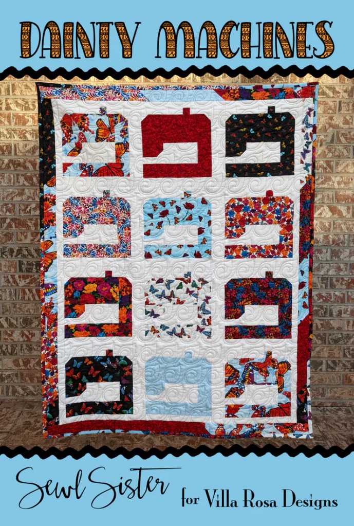 A colorful quilt titled 'Dainty Machines' featuring various sewing machine designs surrounded by floral patterns, created by Sewl Sister for Villa Rosa Designs.