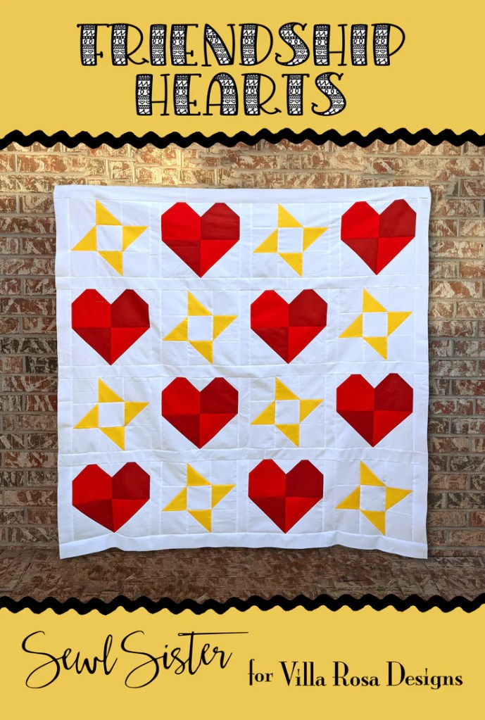 A quilt featuring a pattern of red hearts and yellow star blocks on a white background, labeled 'Friendship Hearts' at the top and 'Sewl Sister for Villa Rosa Designs' at the bottom.