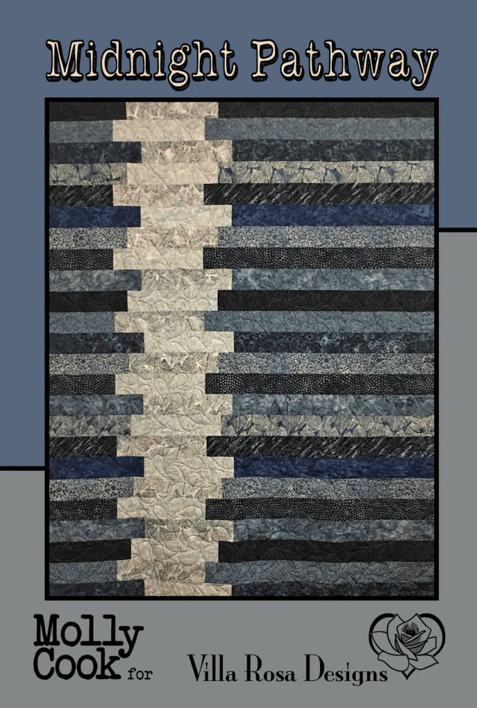 A quilt titled 'Midnight Pathway' featuring a pattern of alternating dark blue, light blue, and cream stripes. The quilt is designed by Molly Cook for Villa Rosa Designs.