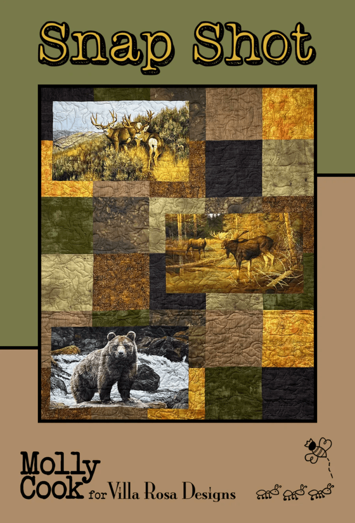 A quilt design titled 'Snap Shot' featuring various wildlife scenes, including deer and a bear, set against a patchwork background of earthy colors.