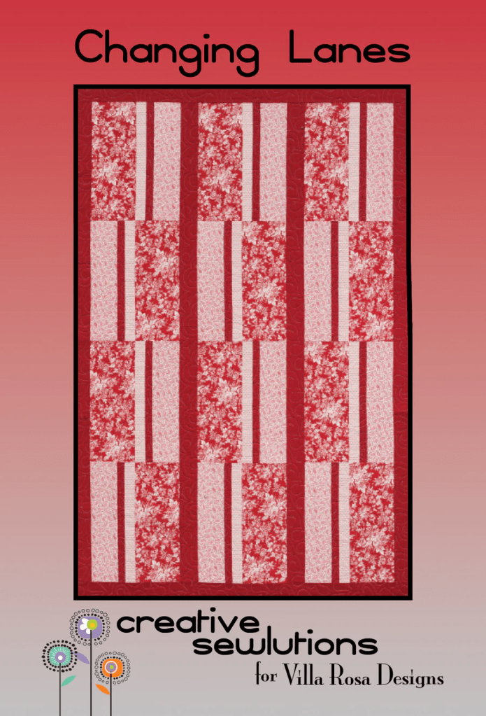 Quilt design titled 'Changing Lanes' featuring alternating red and pink fabric patterns on a gradient background.