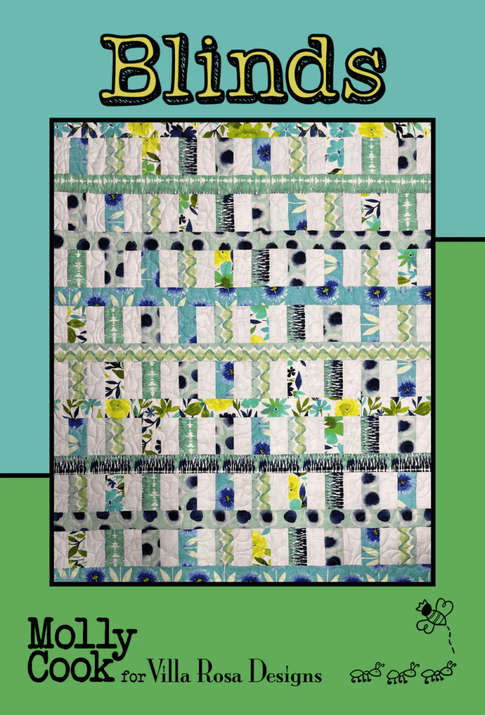 A colorful quilt design titled 'Blinds' featuring a variety of patterns in blue, green, and floral motifs, designed by Molly Cook for Villa Rosa Designs.