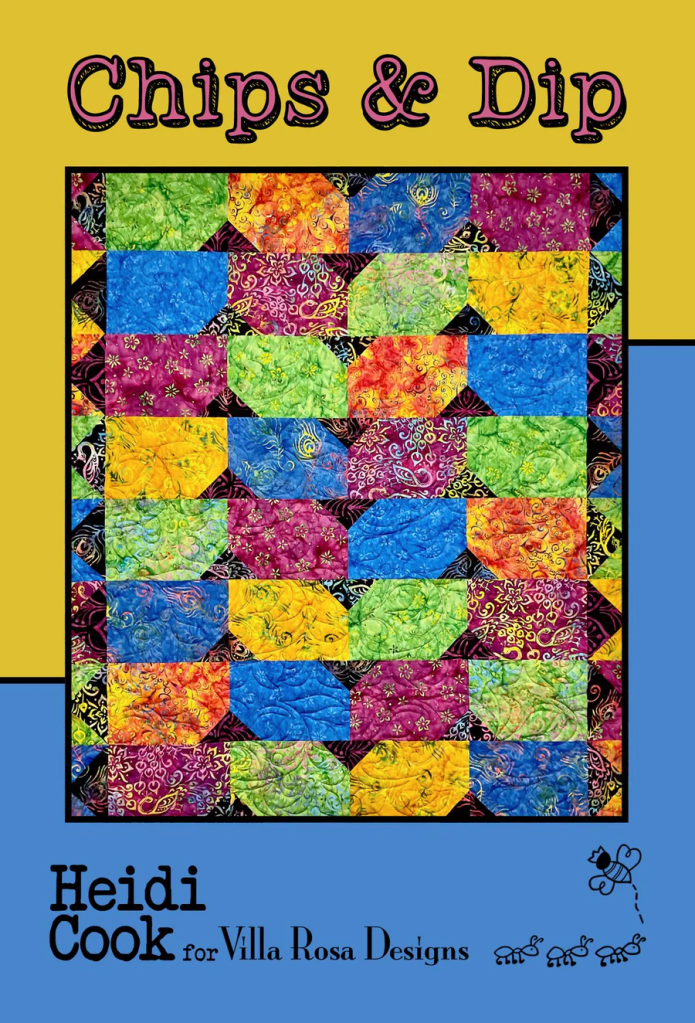 Colorful quilt design titled 'Chips & Dip' featuring a patchwork of vibrant fabric squares in various patterns, created by Heidi Cook for Villa Rosa Designs.