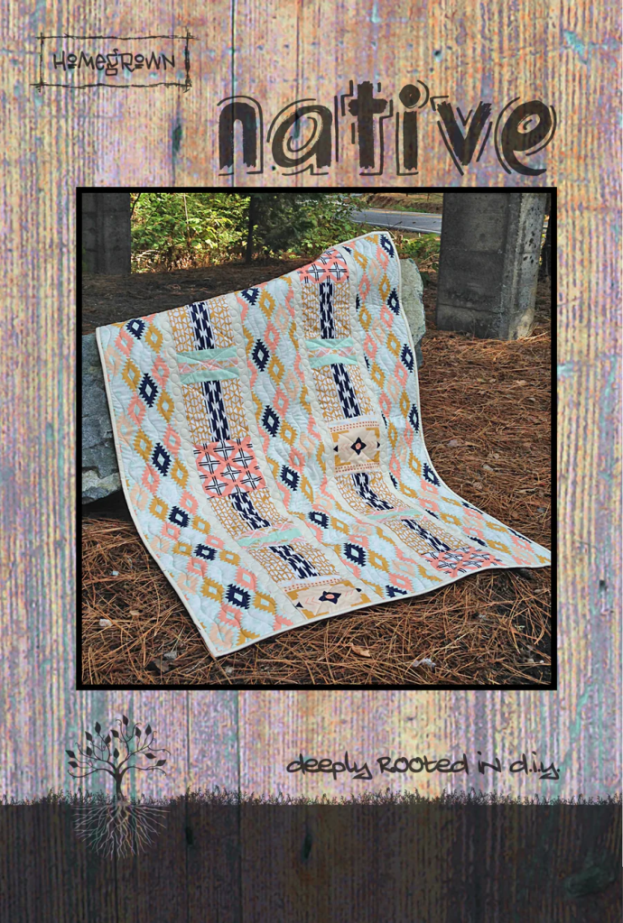 A colorful quilt with geometric patterns displayed on pine needles, set against a backdrop of trees and stone structure. The title 'native' is prominent at the top, and 'deeply rooted in clay' is featured at the bottom.
