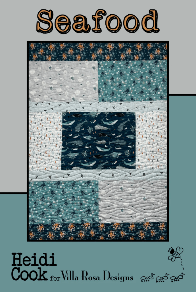 Quilt design featuring a seafood theme with patches depicting fish, octopuses, and waves, titled 'Seafood' by Heidi Cook for Villa Rosa Designs.