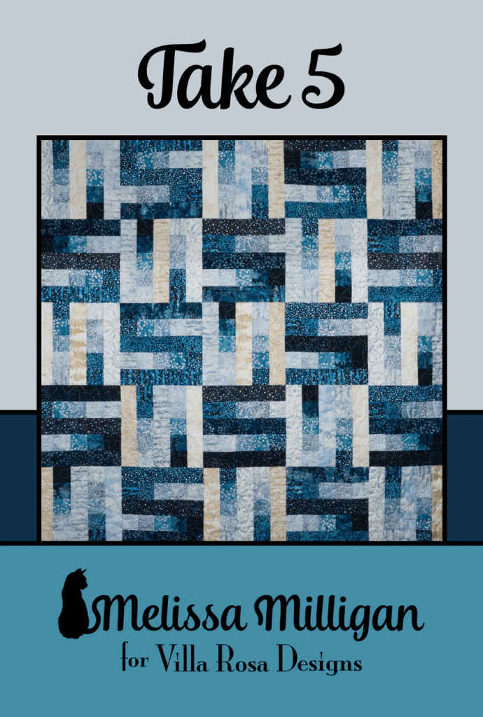A quilt design named 'Take 5' featuring a pattern of blue, cream, and black fabrics arranged in a geometric layout, attributed to Melissa Milligan for Villa Rosa Designs.