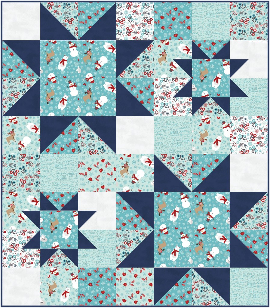 A colorful quilt featuring a patchwork design with blue, white, and red fabrics containing patterns of snowmen, reindeer, and winter-themed motifs.