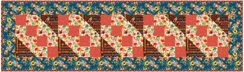 A colorful quilt pattern featuring blocks in reds, floral prints, and text elements on a blue background, creating a vibrant autumn-inspired design.