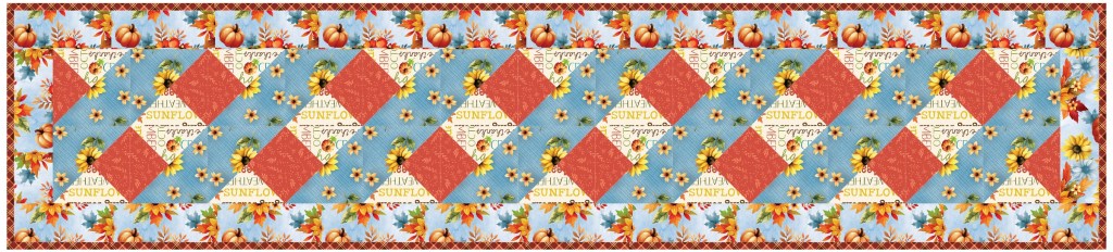 Colorful fabric pattern featuring diamond shapes in red and blue, surrounded by floral designs and autumn leaves.